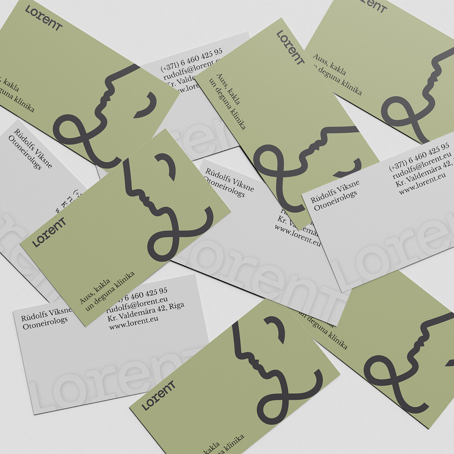 Lorent business cards scattered